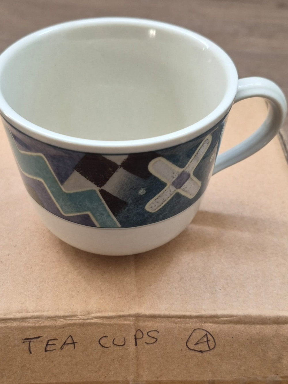 8 Ceramic Tea Cup in Cream with Blue Geometric Band
